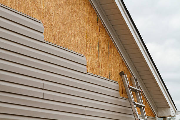 Professional Siding Contractor technician working in Ashville, PA